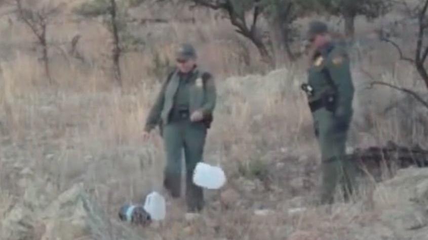 Aid volunteer arrested shortly after border agents shown kicking over water jugs